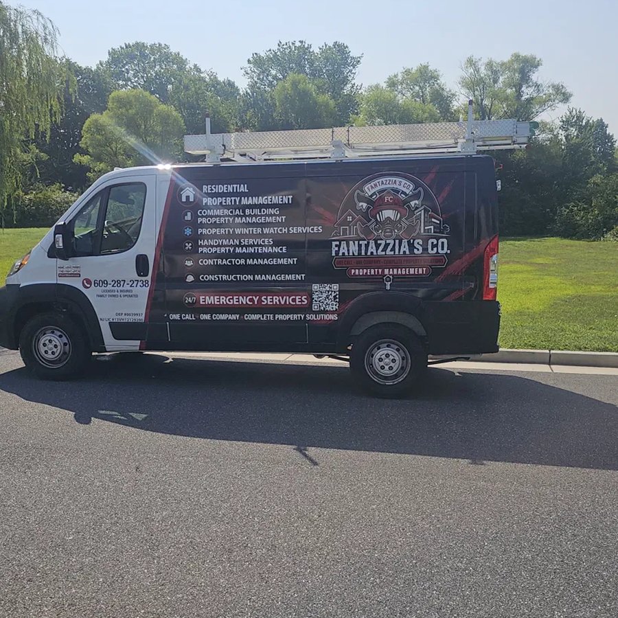 Side of the wrapped Fantazzia Co van listing services