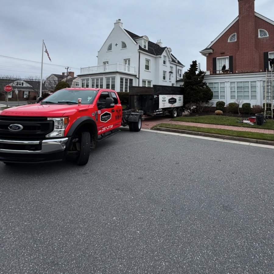 Fantazzia Co truck in front of shore homes